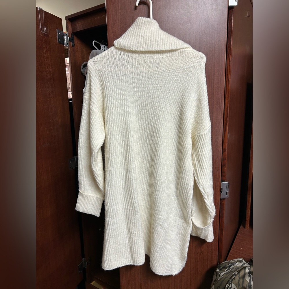 “I just have to have it” cream sweater dress